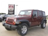 2009 Red Rock Crystal Pearl Jeep Wrangler Unlimited Sahara 4x4 #29201239