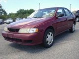 Ruby Red Pearl Metallic Nissan Sentra in 1998