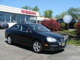 2009 Black Uni Volkswagen Jetta SE Sedan #29536280