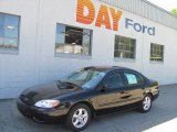 2004 Black Ford Taurus SE Sedan #29599678