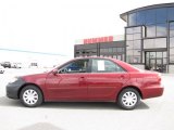 2006 Salsa Red Pearl Toyota Camry LE #29669249