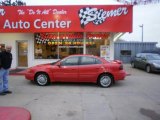 1999 Bright Red Pontiac Grand Am SE Sedan #29831879