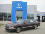 Garnet Red Metallic Cadillac DeVille in 1995