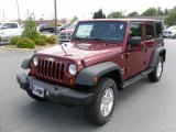 2010 Red Rock Crystal Pearl Jeep Wrangler Unlimited Sport 4x4 #30617178