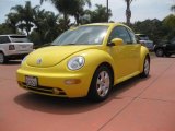 Yellow Volkswagen New Beetle in 2002