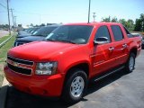 2007 Victory Red Chevrolet Avalanche LS #31038501
