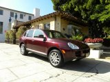 Carmona Red Metallic Porsche Cayenne in 2004