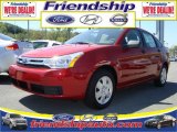 2010 Sangria Red Metallic Ford Focus S Sedan #31079556