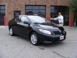 2010 Black Sand Pearl Toyota Corolla XLE #31477892