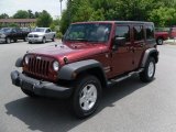 2010 Red Rock Crystal Pearl Jeep Wrangler Unlimited Sport 4x4 #31537028