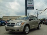 2009 Light Sandstone Metallic Dodge Caliber SXT #31585095