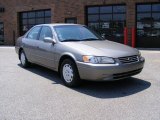 1999 Antique Sage Pearl Toyota Camry LE #31963743