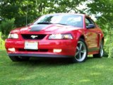 2004 Torch Red Ford Mustang Mach 1 Coupe #32025528