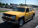 Yellow Chevrolet Avalanche in 2003