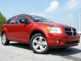 Sunburst Orange Pearl Dodge Caliber in 2010