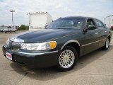 Dark Satin Green Metallic Lincoln Town Car in 1999