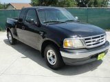 1999 Black Ford F150 XLT Extended Cab #32945140