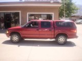 Dark Cherry Red Metallic GMC Sonoma in 2003