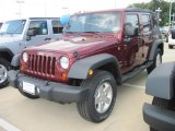 2010 Red Rock Crystal Pearl Jeep Wrangler Unlimited Sport 4x4 #33189348