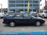 2000 Medium Royal Blue Metallic Ford Taurus SE #33548706