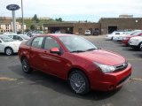 2011 Sangria Red Metallic Ford Focus SES Sedan #33606022