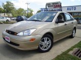 2000 Fort Knox Gold Metallic Ford Focus SE Sedan #33744613