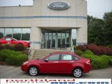 2010 Sangria Red Metallic Ford Focus SEL Sedan #34167715