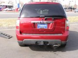 Lingonberry Red Metallic Saab 9-7X in 2006
