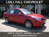 2010 Sangria Red Metallic Ford Focus SES Sedan #35054631