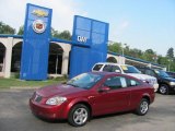 Performance Red Tintcoat Pontiac G5 in 2009