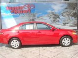 2010 Barcelona Red Metallic Toyota Camry LE #35553026