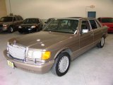 Brown Mercedes-Benz 420 SEL in 1990