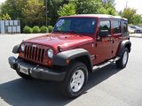 2010 Red Rock Crystal Pearl Jeep Wrangler Unlimited Sport 4x4 #36064679
