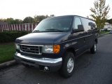 Black Cleacoat Ford E Series Van in 2005