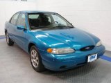Bright Blue Metallic Ford Contour in 1996