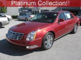 Crystal Red Tintcoat Cadillac DTS in 2010