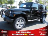 2011 Black Jeep Wrangler Unlimited Sahara 4x4 #37321847