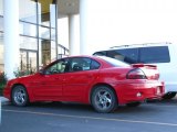 2002 Bright Red Pontiac Grand Am GT Sedan #37699844