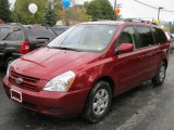 2008 Claret Red Metallic Kia Sedona LX #37700097