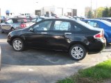 2011 Ebony Black Ford Focus SEL Sedan #37946080