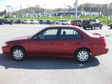 2001 Impulse Red Toyota Corolla S #38917241