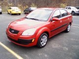 2009 Tropical Red Kia Rio LX Sedan #39059278