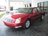 Crystal Red Tintcoat Cadillac DTS in 2011