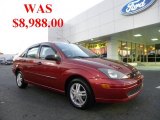 2004 Sangria Red Metallic Ford Focus SE Sedan #39502732