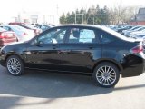 2011 Ebony Black Ford Focus SES Sedan #39598113