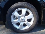 2011 Nissan Versa 1.8 SL Hatchback Wheel