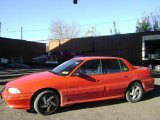 1994 Bright Red Pontiac Grand Am GT Sedan #39667034