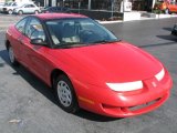 Bright Red Saturn S Series in 1998