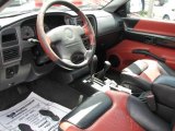 1999 Isuzu VehiCROSS  Carbon Black/Martian Rock Red Interior