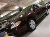 2001 Chestnut Metallic Ford Taurus LX #39739459